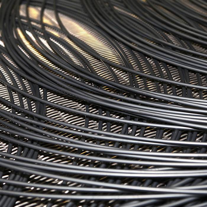 A roll of black annealed wires with bright colors