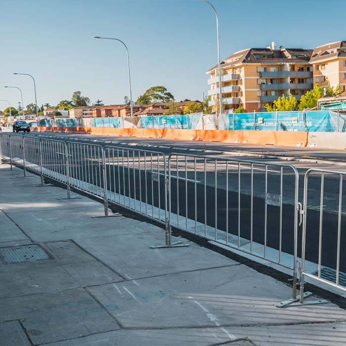 Crowd control barrier is set along the highway for traffic control.