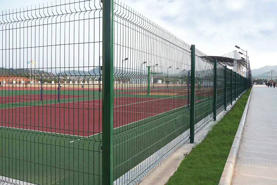 Curvy welded fence is installed along the running race.