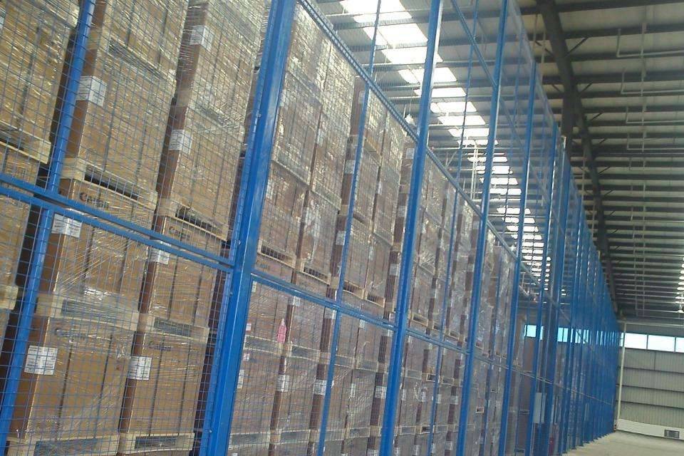 Many goods are placed neatly in the partition fence made of welded wire mesh panels.